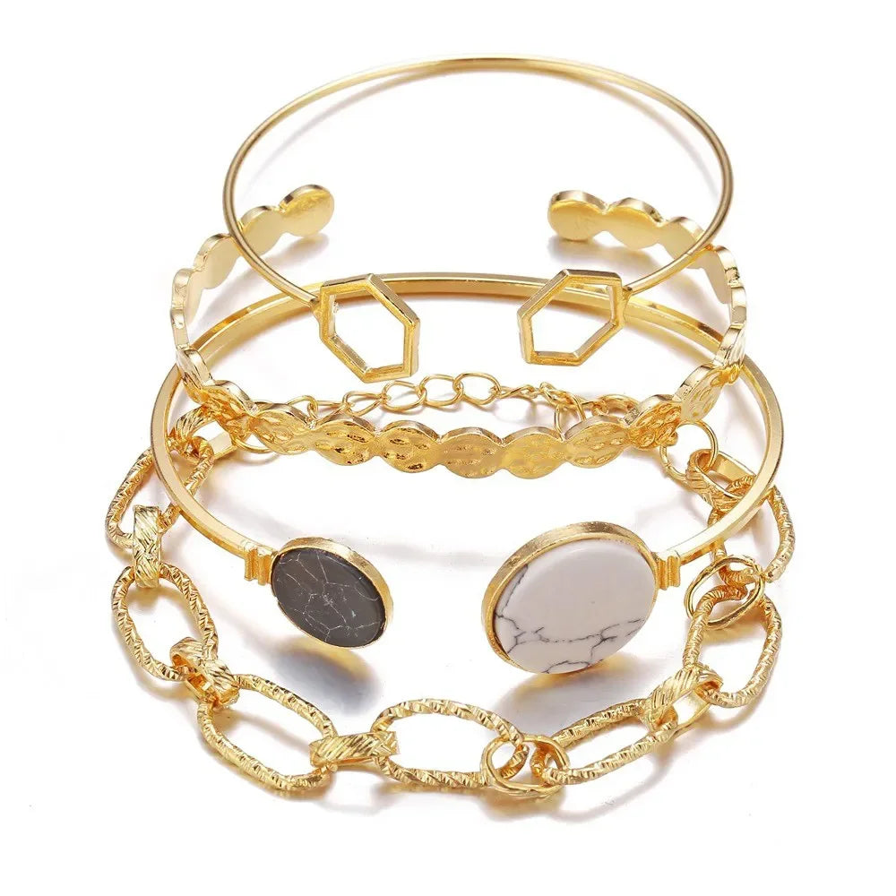 Gold-tone mixed chain bracelet set with open circle bangles and medallion charms