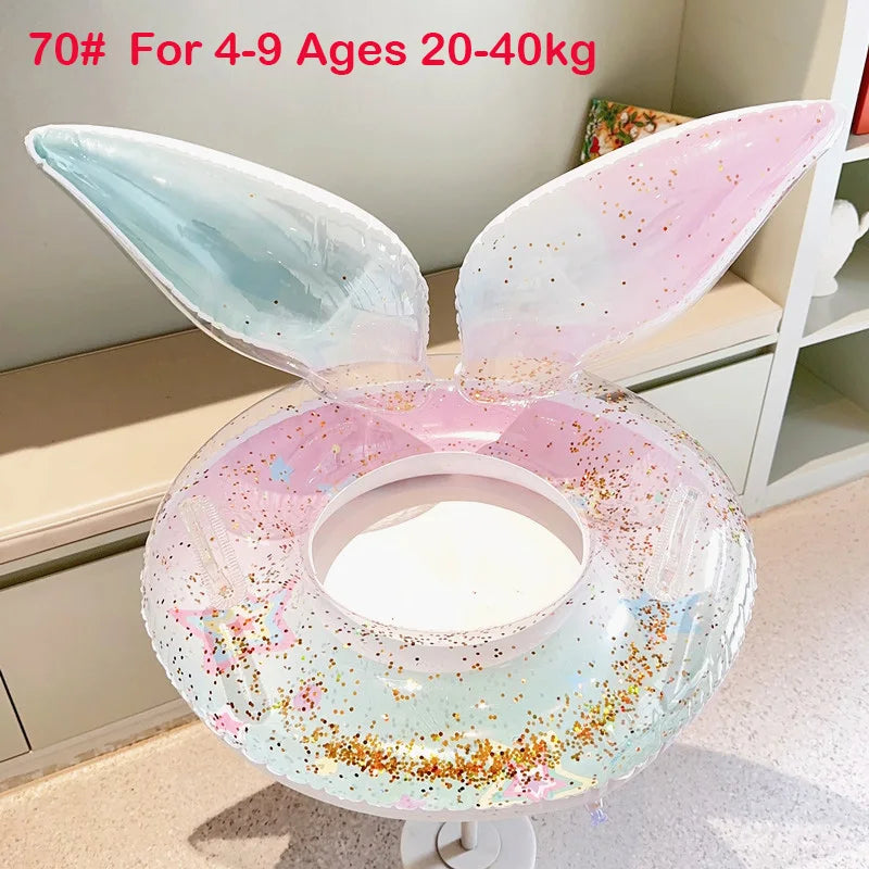Pastel glitter inflatable donut swim ring float with two fin-like handles