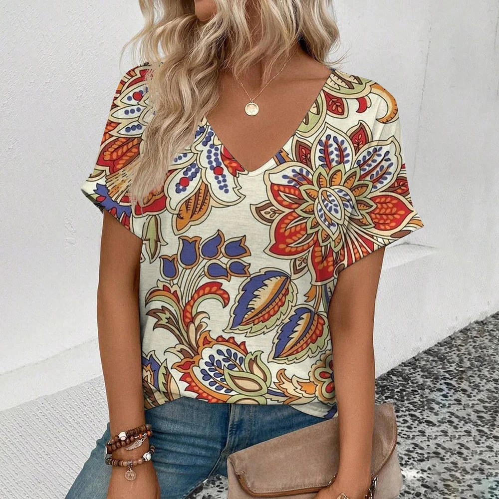 Women's plus-size V-neck T-shirt, cream with colorful paisley floral print.