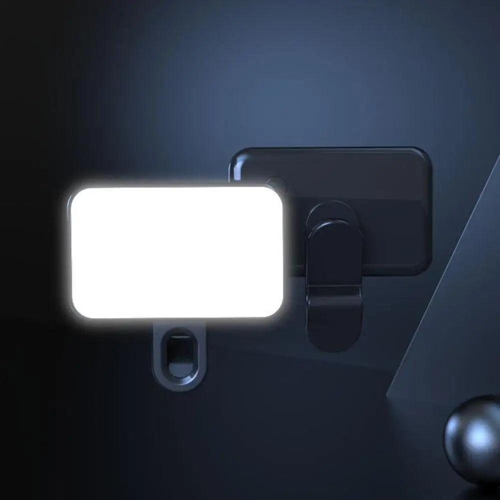 Pocket LED selfie light with clip, illuminated panel mounted on phone