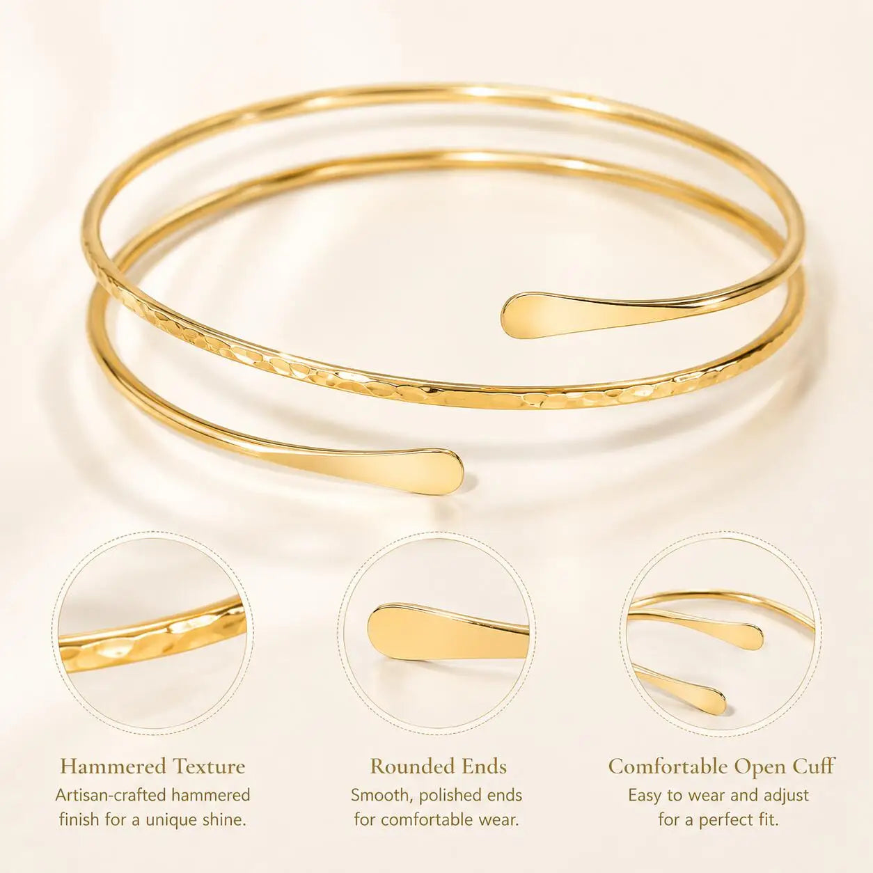 Gold-tone double-wrap arm cuff bracelet featuring hammered texture and rounded end bar