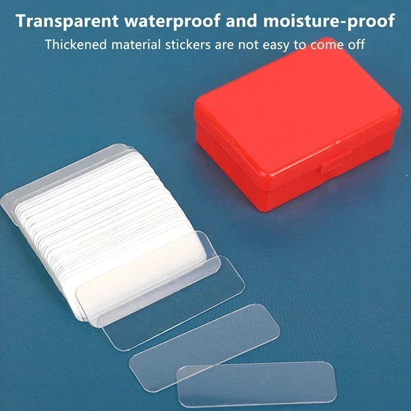 Clear waterproof double-sided tape strips with red and gray storage cases, laid out.