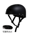 Black kids bike helmet with ventilation holes and chin strap, plus fit strap detail.