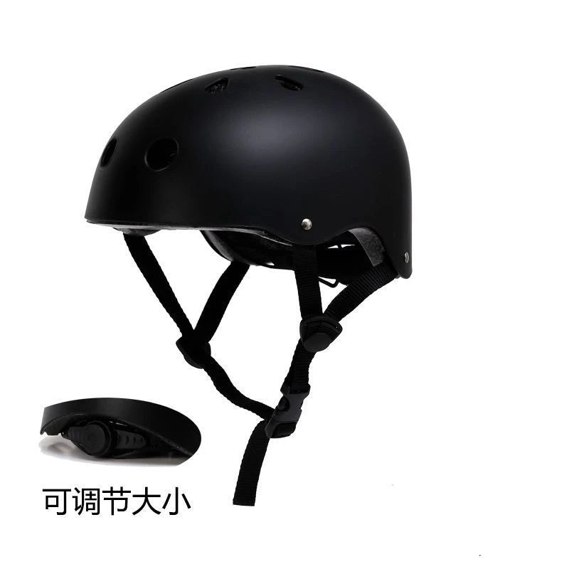 Black kids bike helmet with ventilation holes and chin strap, plus fit strap detail.