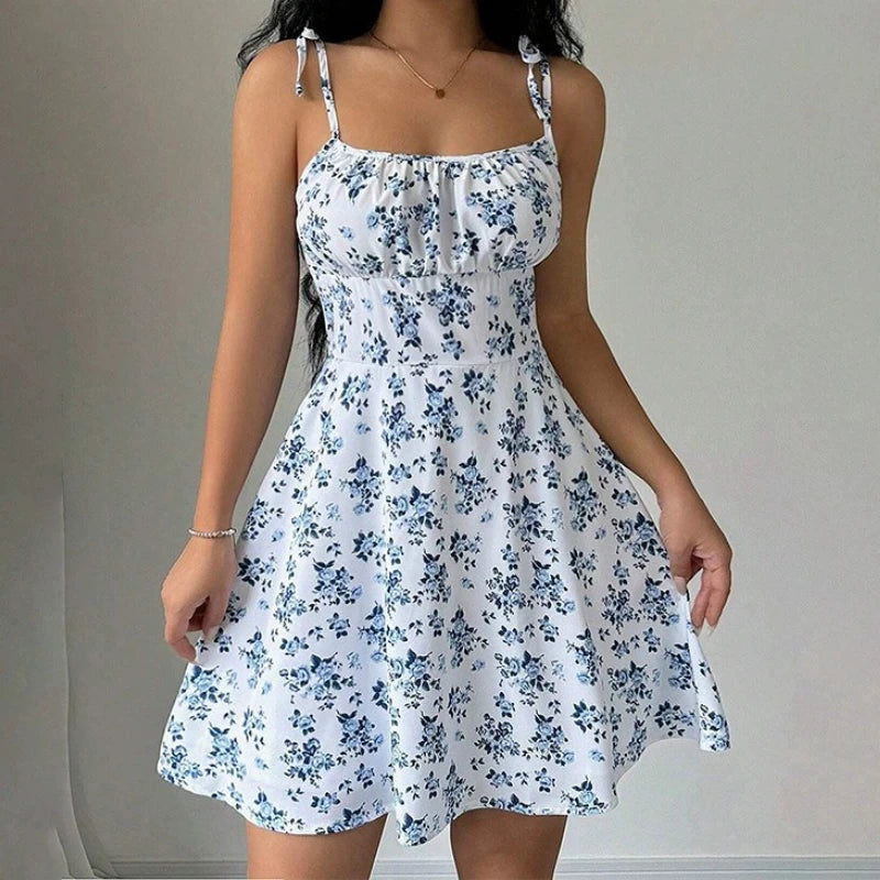Blue floral spaghetti-strap mini dress with square neckline and tie straps