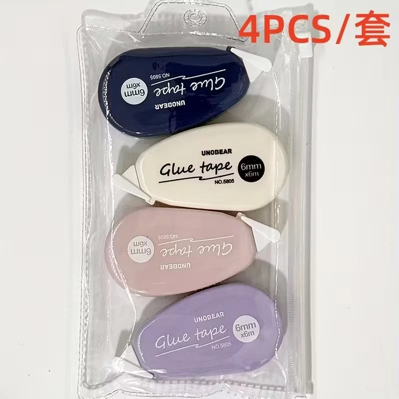 Pack of four double-sided adhesive tape dispensers in blue, white, pink, and lavender