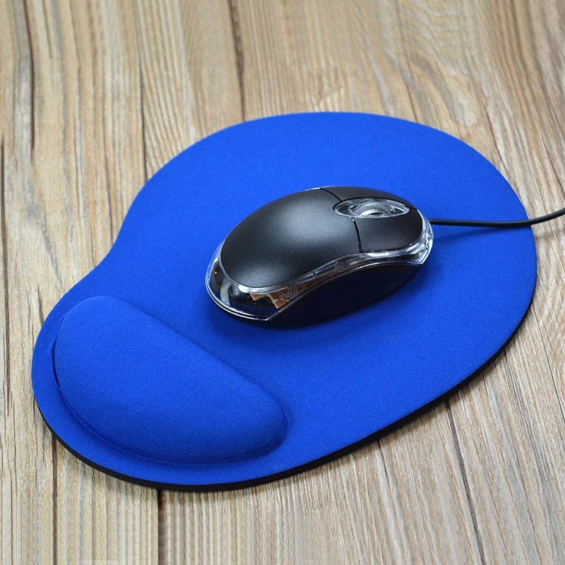 Blue mouse pad with cushioned wrist rest, black wired mouse on top