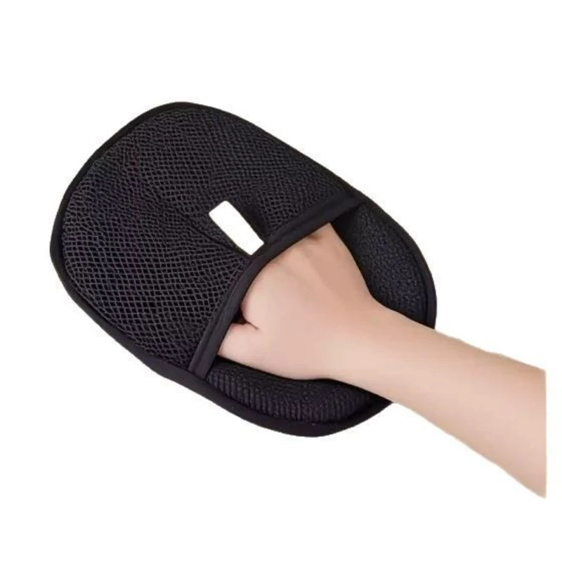 Black pet hair remover glove with padded mesh surface for grabbing pet hair