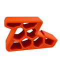 Orange door stop wedge with track lock, anti-collision honeycomb grip design