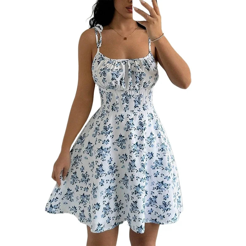 Blue floral spaghetti-strap mini dress with ruched chest and gathered skirt