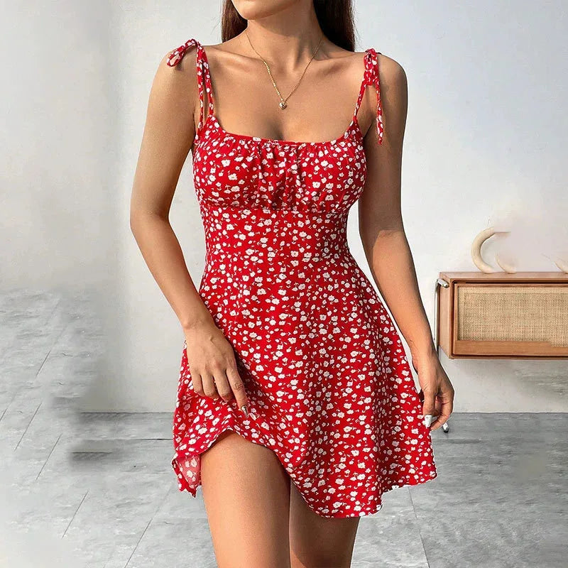 Red floral spaghetti-strap mini dress with ruched bodice and flared skirt