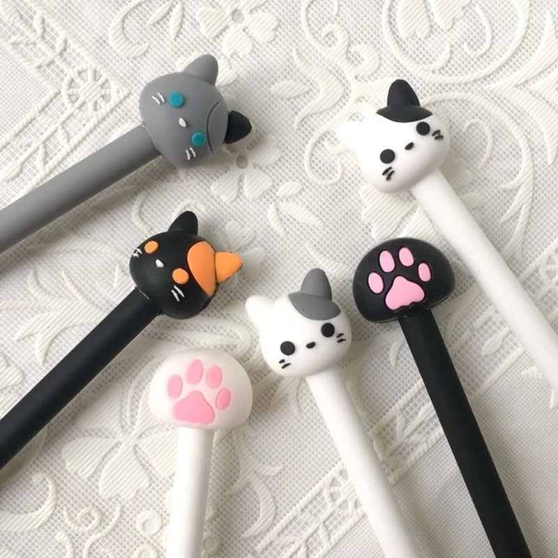 Kawaii cat gel pens set with white and black barrels, cat-face and paw toppers