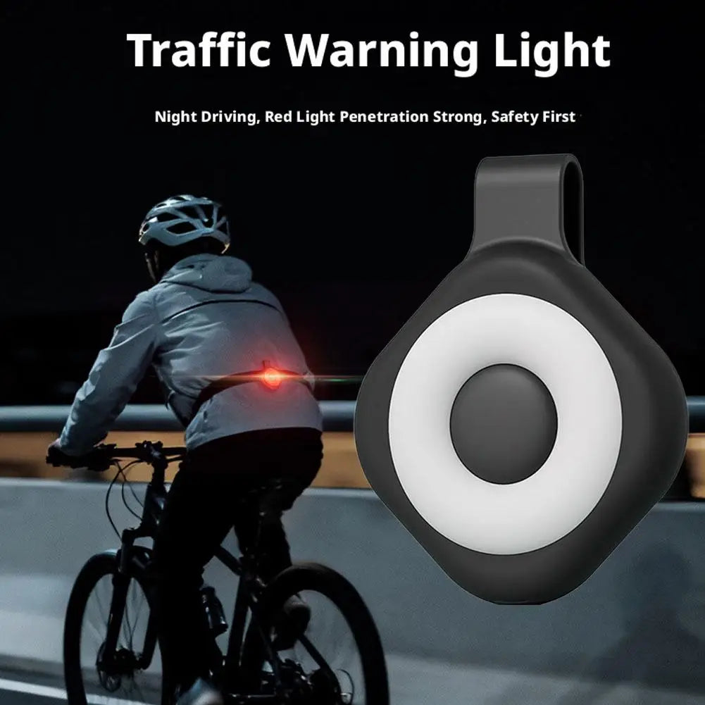 Traffic warning LED ring light with bright white ring glow and small red indicator light