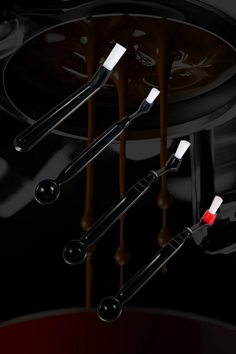 Coffee cleaning brush set with black handles, white bristles, and one red-tipped head