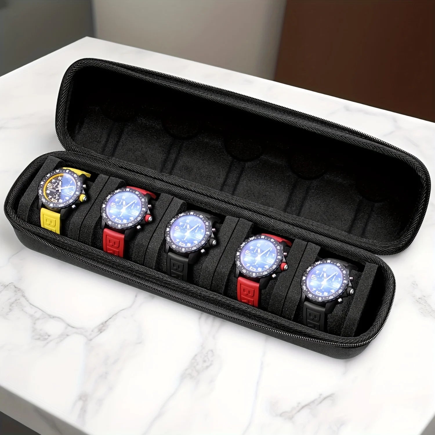 Black 5-slot watch travel organizer with foam padding, shown holding multiple watches.