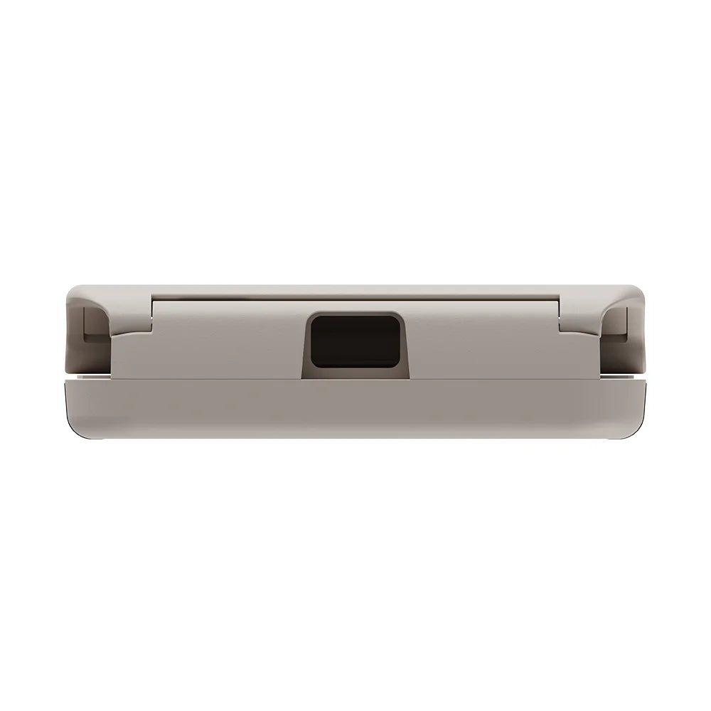 Back/underside of white pocket controller with central dark port and hinge tabs
