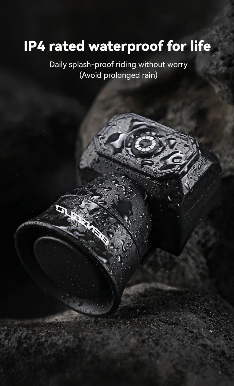 Black waterproof bike horn bell with water-splash droplets on the front