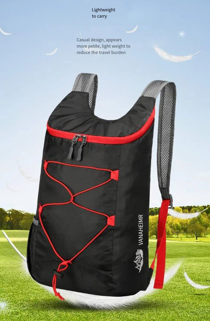 Black folding backpack with red trim, front pocket panels, and mesh shoulder straps