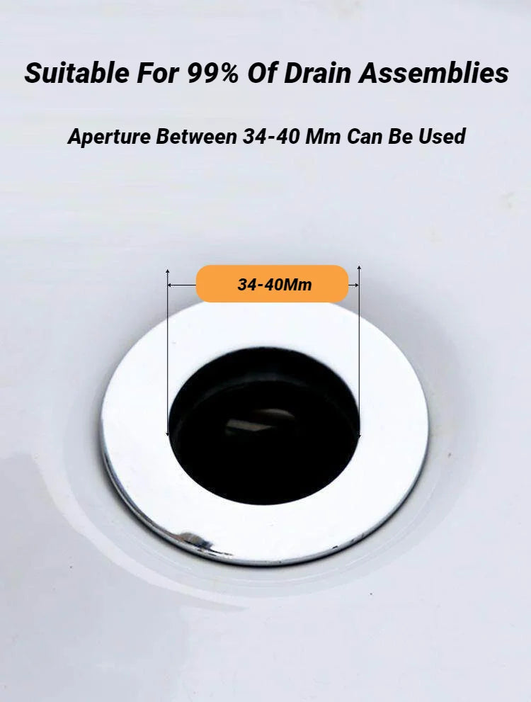 Chrome basin drain stopper with circular cover and dark drain opening inside