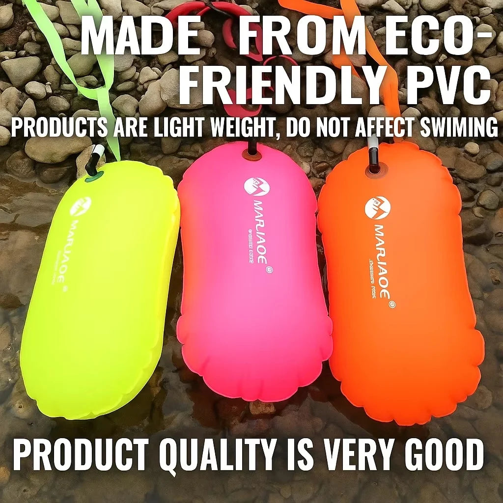 Inflatable swim buoy tow floats in green, pink, and orange with air valves