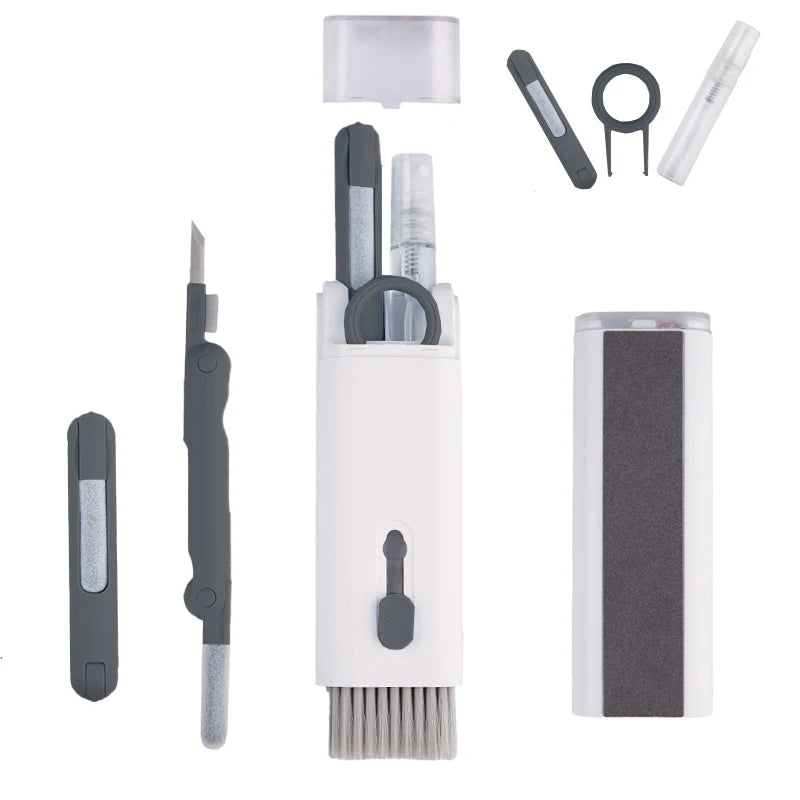 Keyboard cleaning brush kit with black tools, keycap puller, and sponge pad