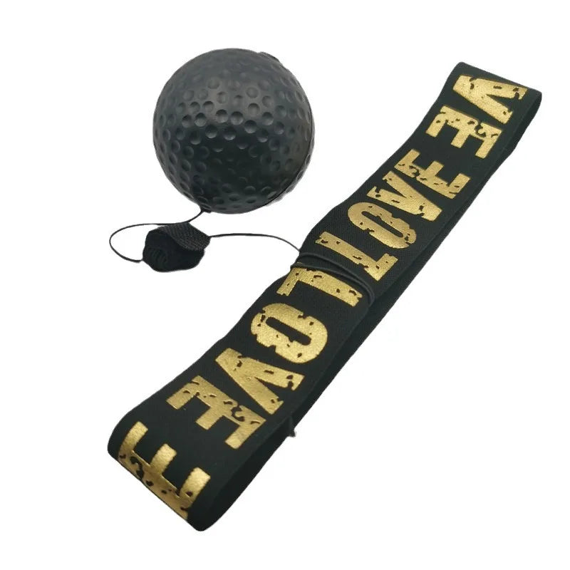 Black textured punch ball with black-and-gold workout strap and attached cord