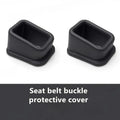 Two seat belt buckle protective covers, black open-cradle design on white background