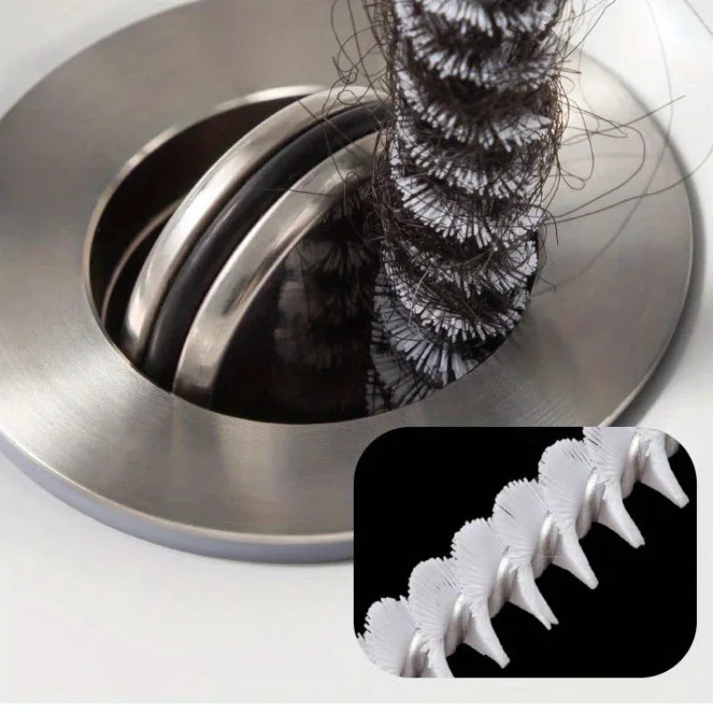 Spiral bristle pipe cleaning brush head showing dense bristles near sink drain