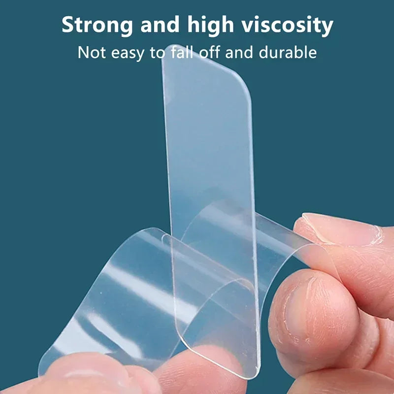 Transparent double-sided adhesive strip with protective release tab, pressed by hand