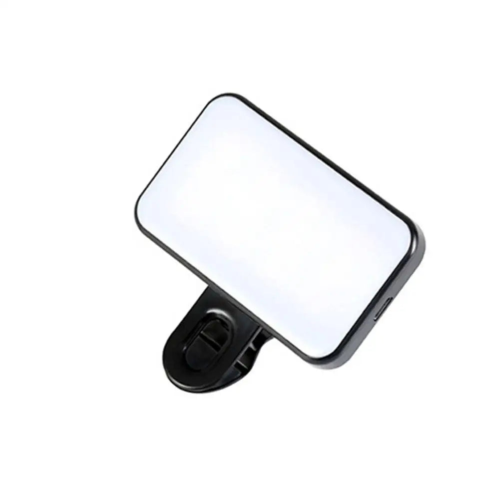 Rectangular pocket LED selfie light with clip and glowing diffuser for front camera photos