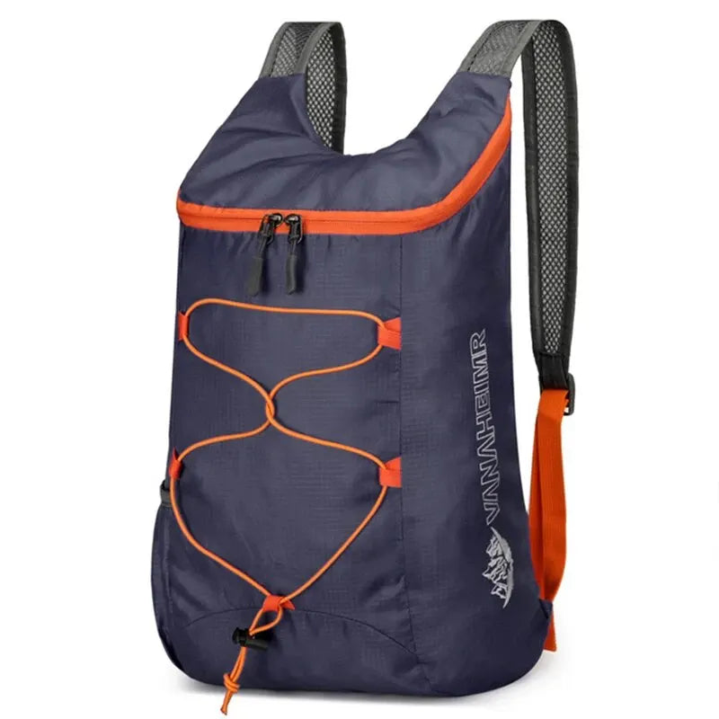 Navy folding backpack with orange trim, front bungee organizer and mesh back straps
