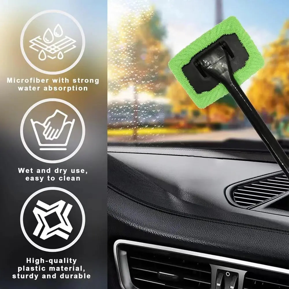 Windshield cleaning brush with green microfiber head and long black handle