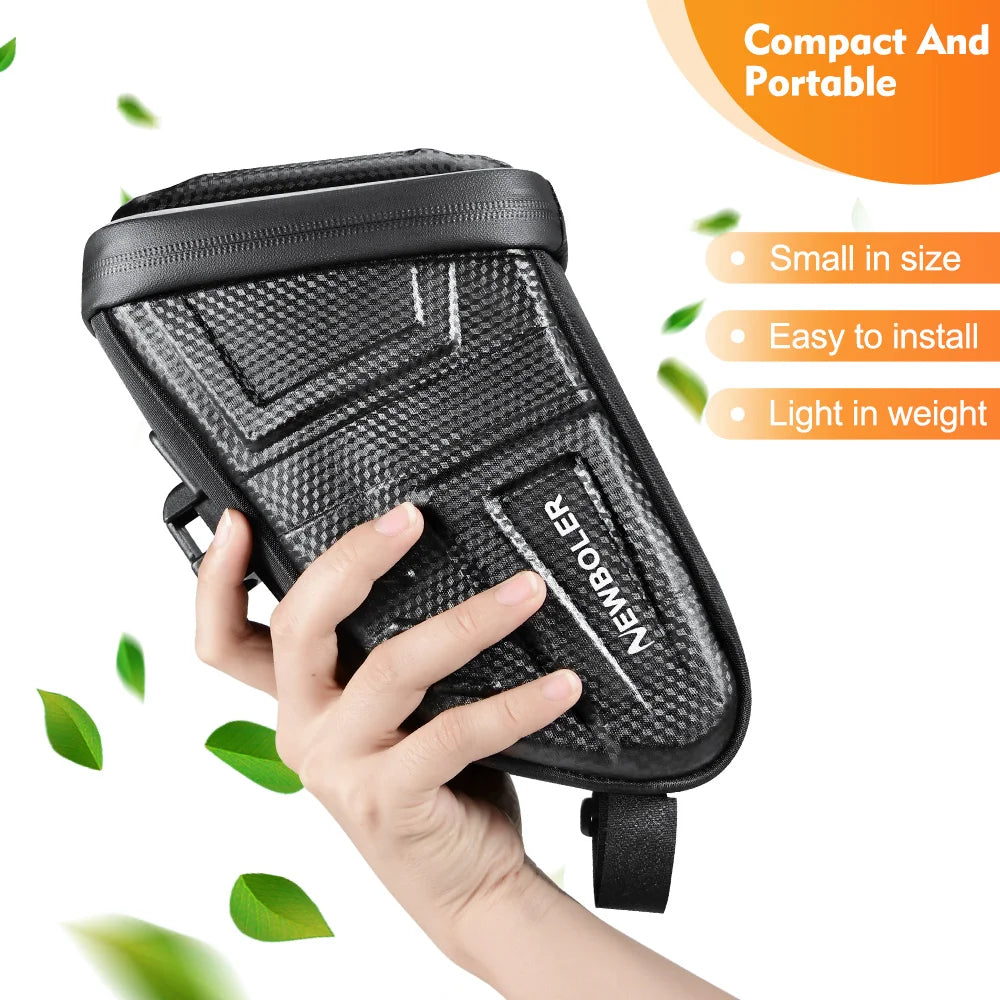 Compact black bicycle saddle bag held in hand with textured surface and mounting strap