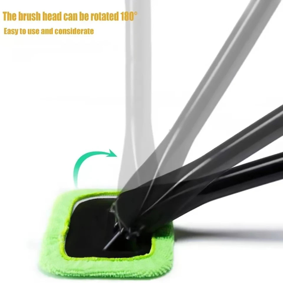 Windshield cleaning brush with rotatable green microfiber head and long black handle