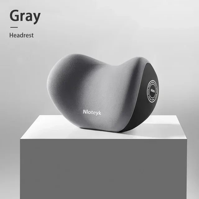 Memory foam headrest pillow, gray curved cushion with side logo detail