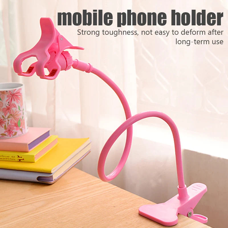 Pink flexible phone holder with adjustable clip and coiled spring arm stand