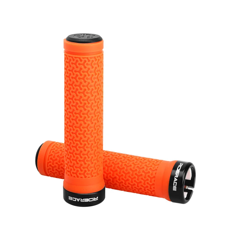 Orange rubber bicycle handlebar grips with textured pattern and locking end caps