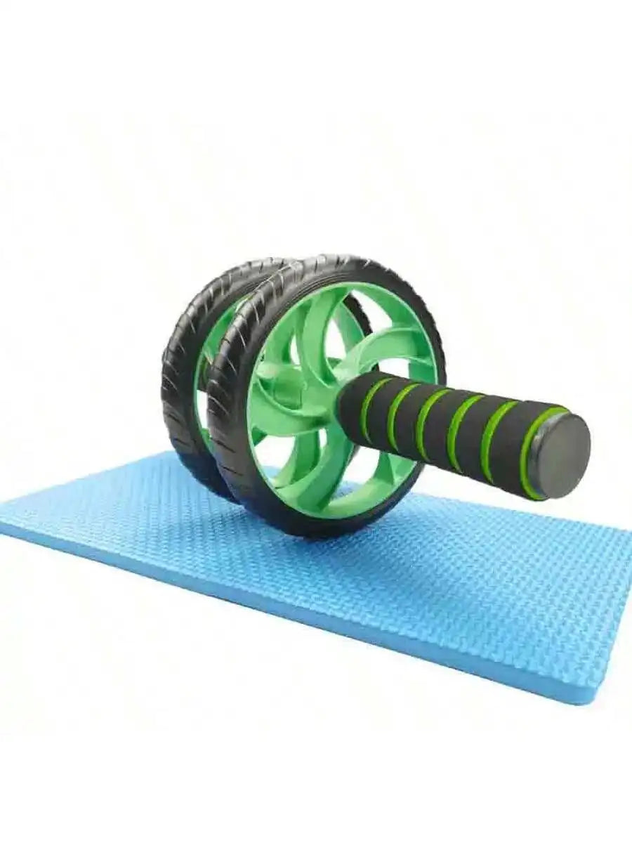 Green dual-wheel abdominal roller with black ribbed foam handles on exercise mat