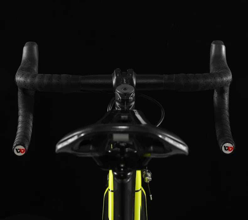 Bike handlebar with black handlebar tape wrap and textured grip surfaces