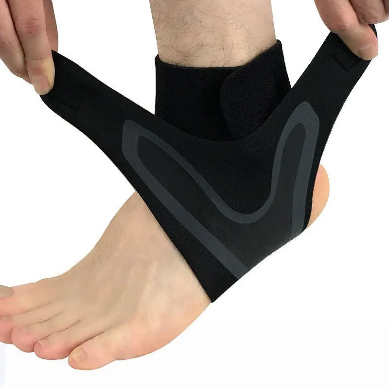 Black ankle support compression sleeve with gray logo across ankle