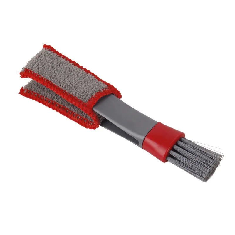 Car cleaning brush tool with gray scrubbing pads and red trim, gray bristle end