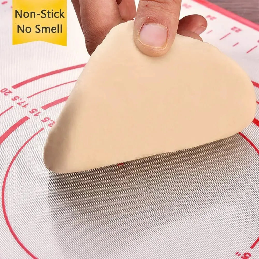 Silicone dough mat with red concentric rings and nonstick surface under a dough piece
