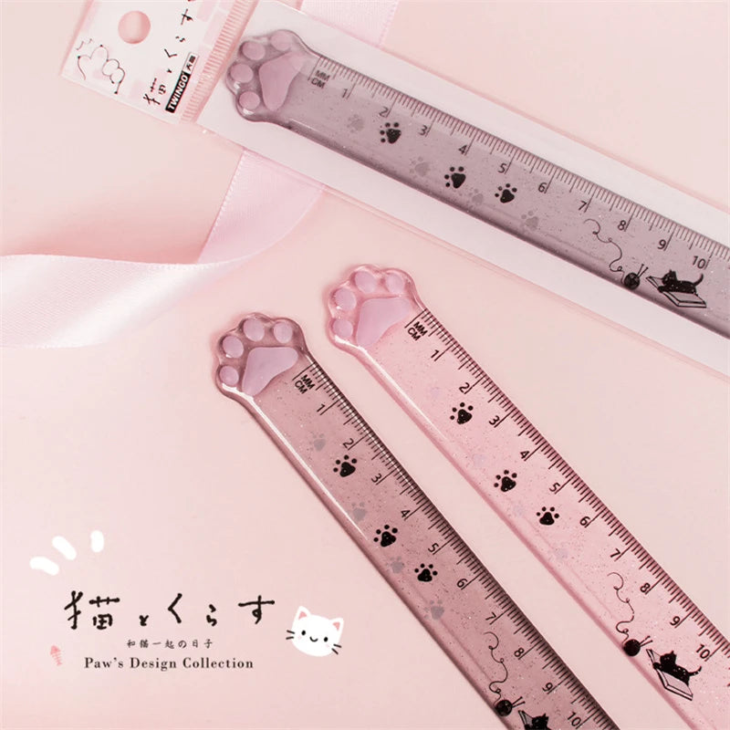 Pair of cat paw plastic straight rulers, pink and gray, with paw prints and numbers