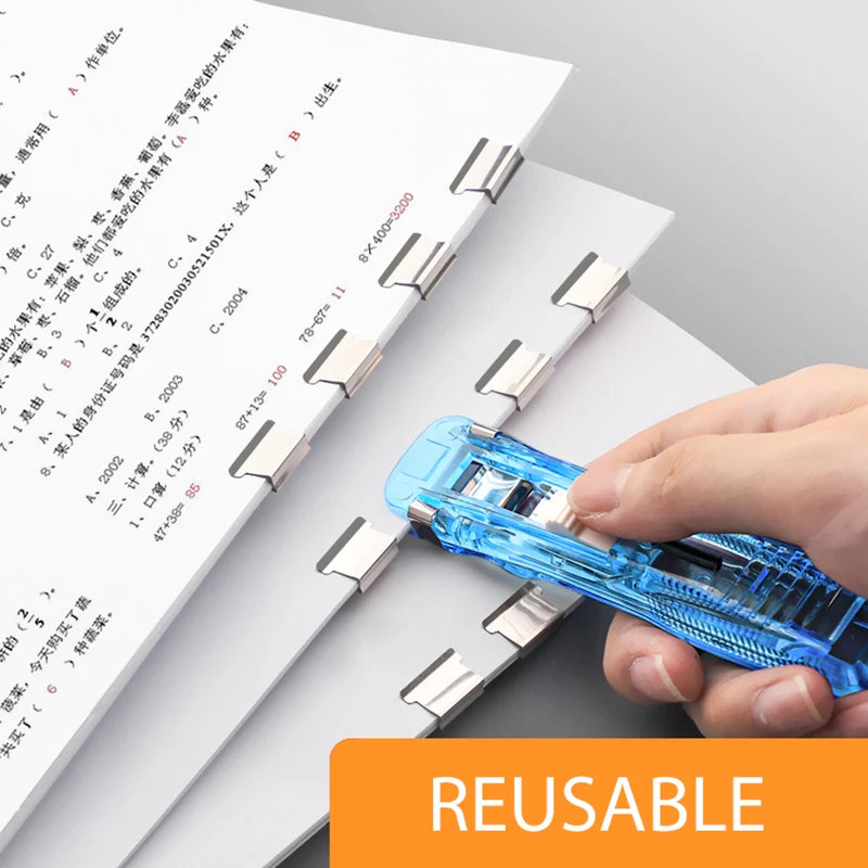Reusable push paper stapler clamp in clear blue with metal staple parts