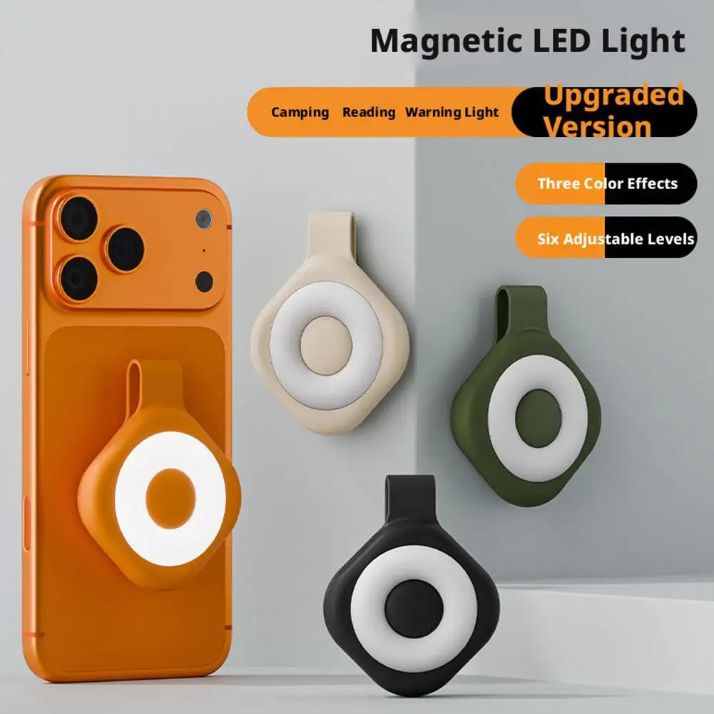 Magnetic LED ring light set in orange, green, black, and white with glowing rings