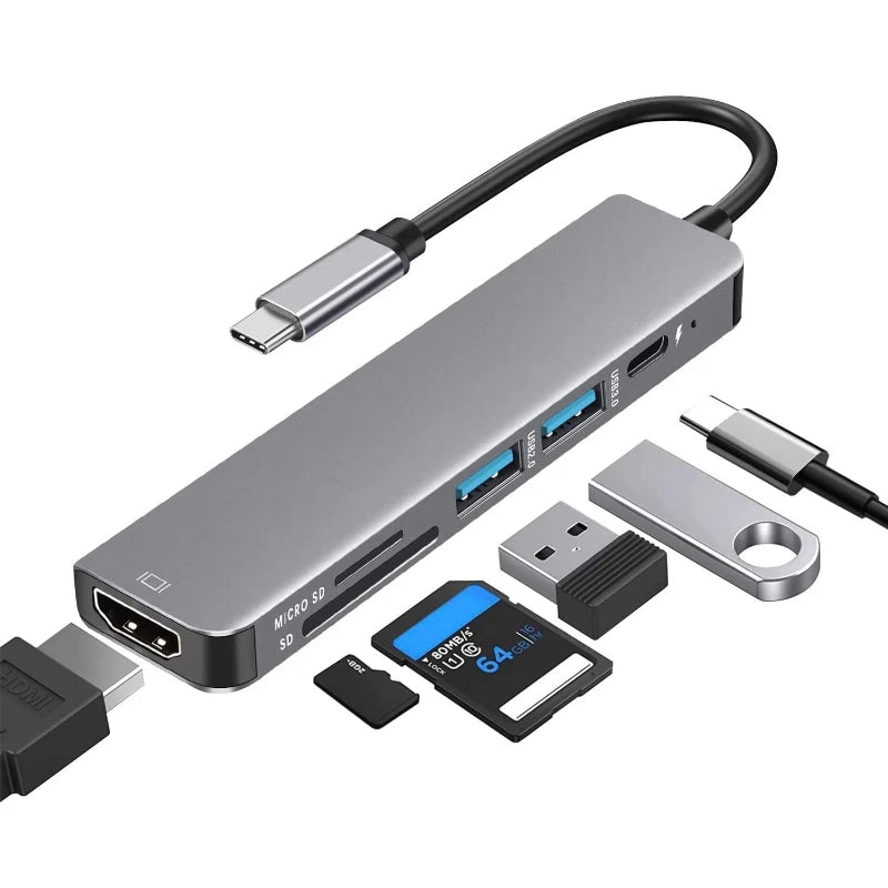 USB-C hub with HDMI, USB ports, and SD/microSD card slots, with included adapters
