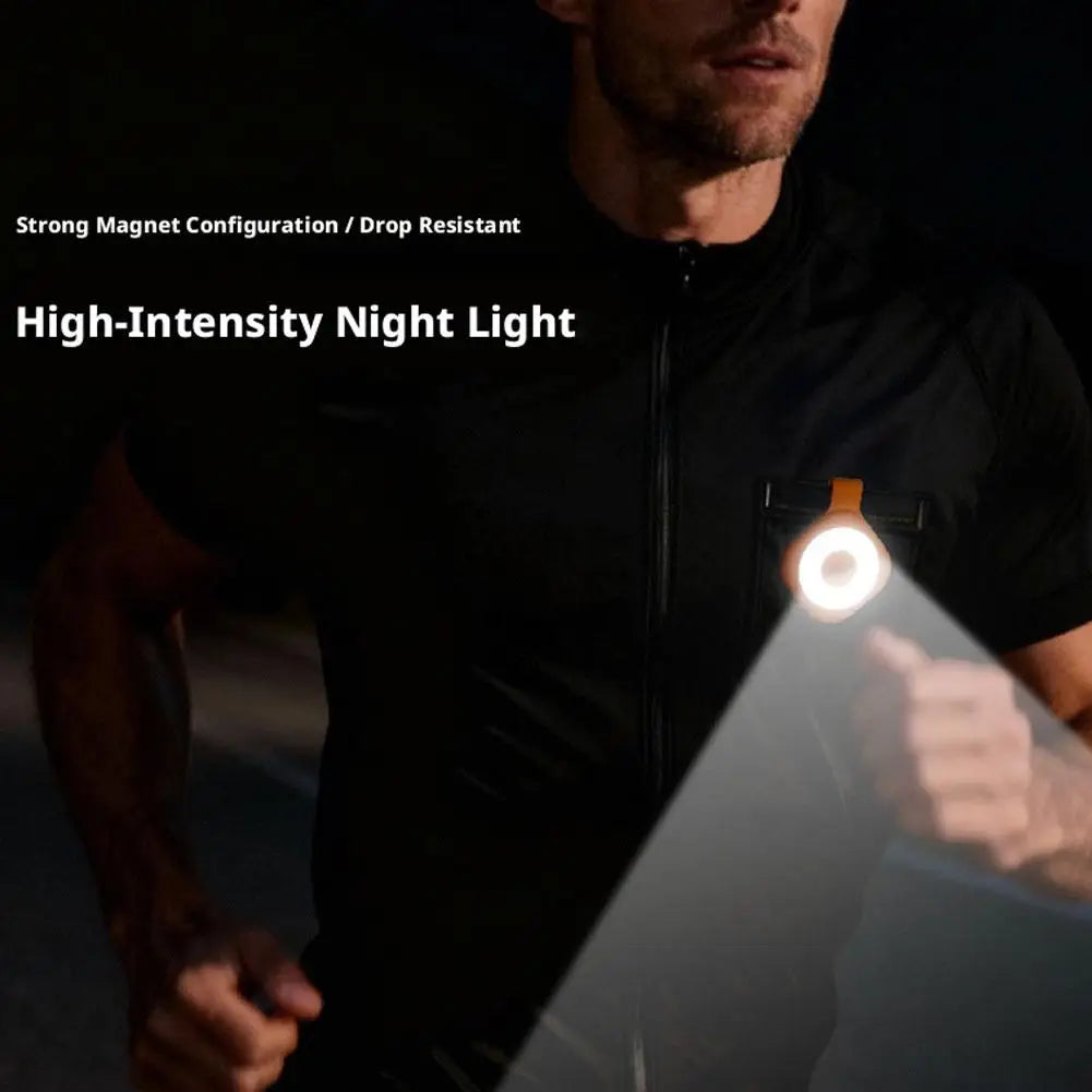 High-intensity magnetic LED night light emitting a bright ring glow during work
