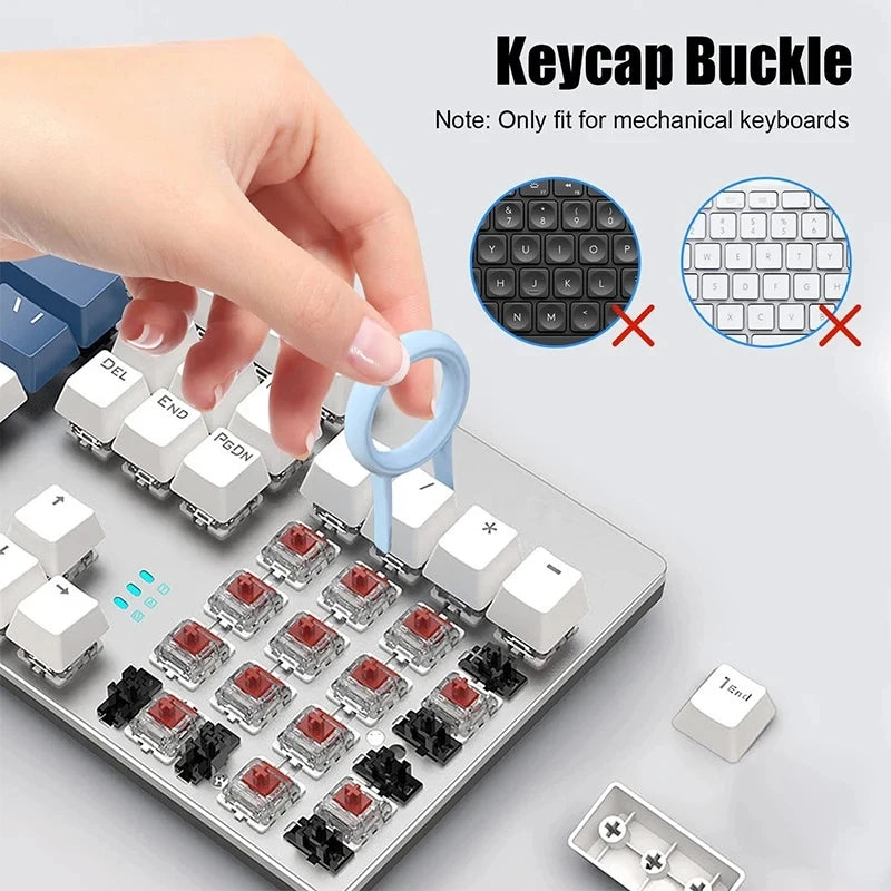 Keycap puller loop tool lifting keycaps from a mechanical keyboard