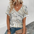 Women's plus-size V-neck t-shirt with short sleeves and light gray abstract swirl print
