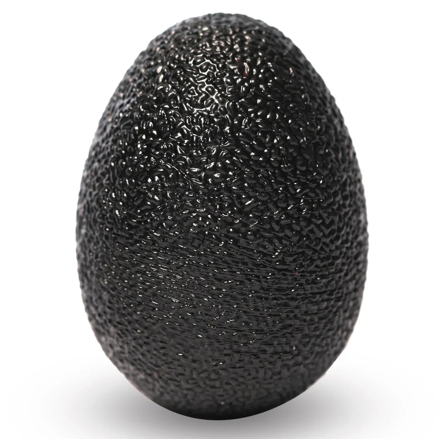 Dark gray egg-shaped grip strength ball with textured surface